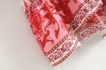 Fusta de dama actuala model asimetric cu motive florale