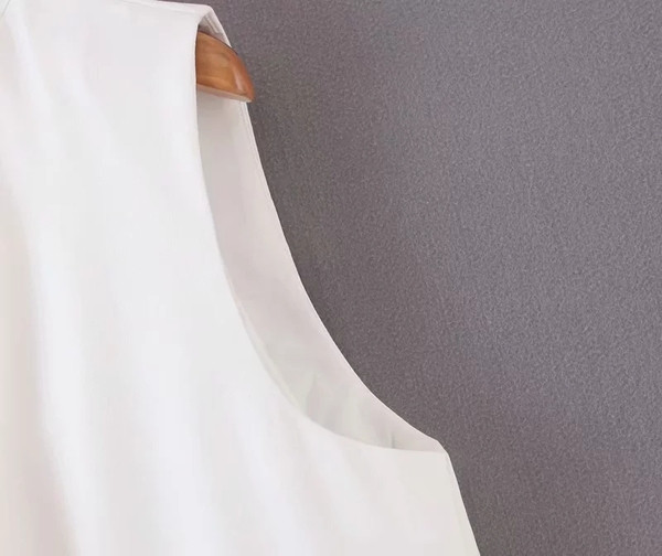 Vestă elegantă pentru femei în alb