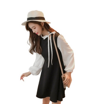 Aktuális női ruha fekete színben, hosszú ujjal