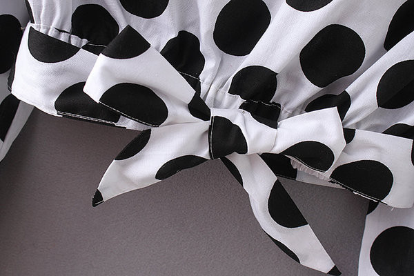 Bluză de damă elegantă cu buline în alb