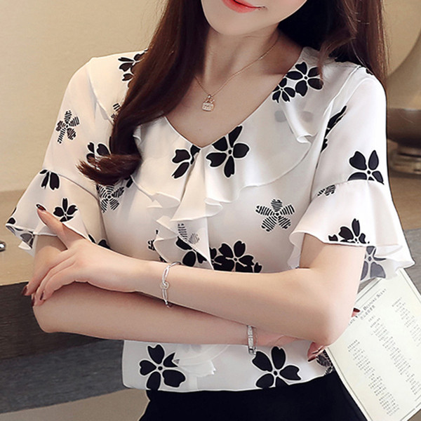 Női modern blúz három színben virágos motívumokkal