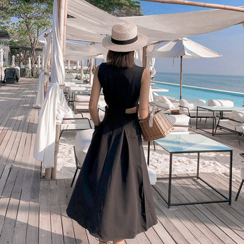 Rochie actuală de damă cu părți decupate ale taliei de culoare neagră