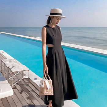 Rochie actuală de damă cu părți decupate ale taliei de culoare neagră