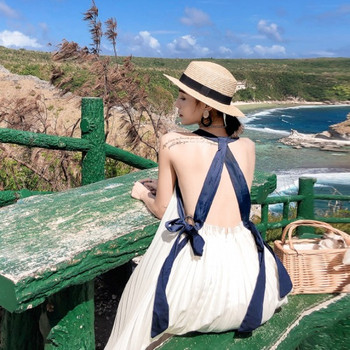 Modern női ruha széles modell, fehér háttal