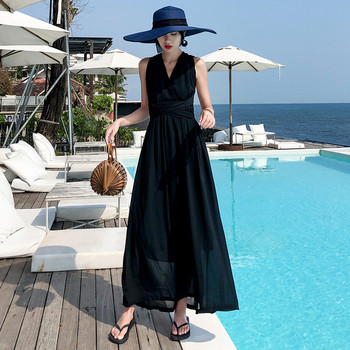 Hosszú női ruha keresztezett pántokkal, fekete színben