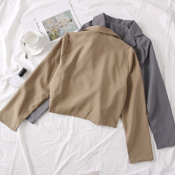 Modern női kabát fehér, fekete, barna és szürke színekben