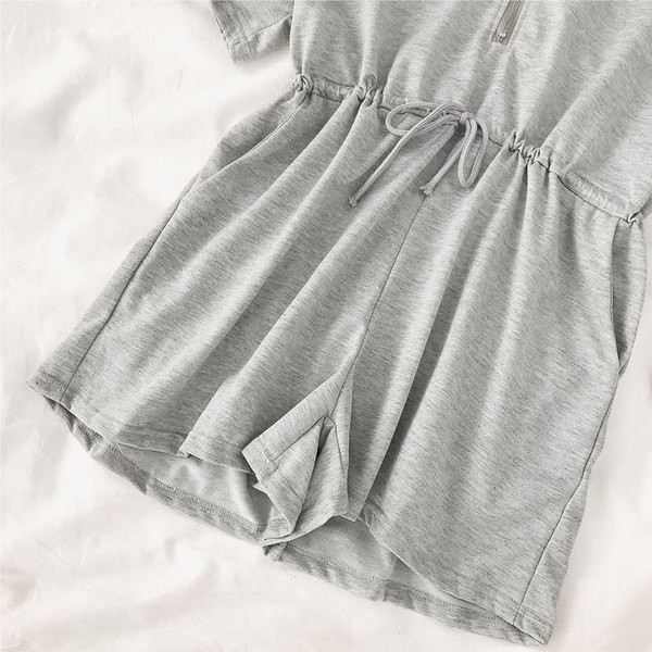 Női alkalmi overall kapucnival és cipzárral fekete és szürke színben