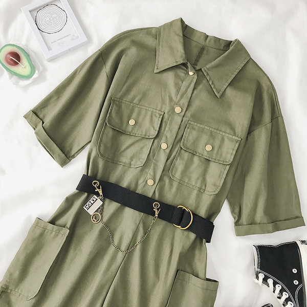 Modern női overál szürke és zöld övvel