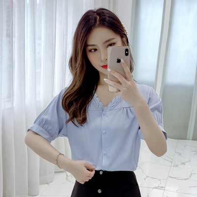 Modern női ing sárga és kék színben, V-nyakkal