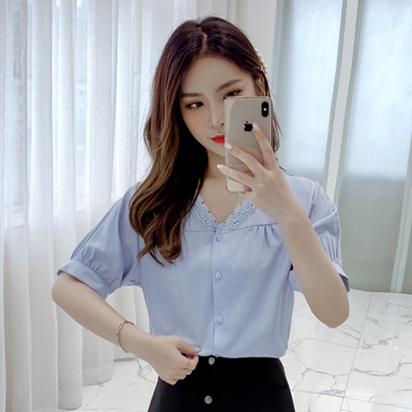 Modern női ing sárga és kék színben, V-nyakkal