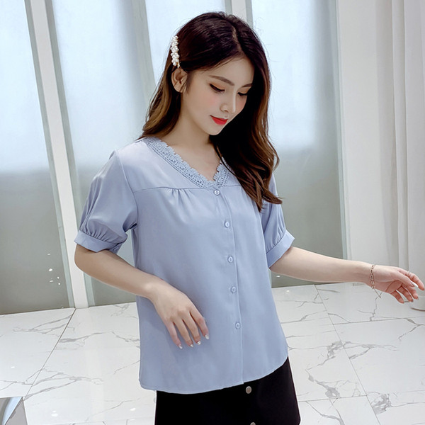 Modern női ing sárga és kék színben, V-nyakkal