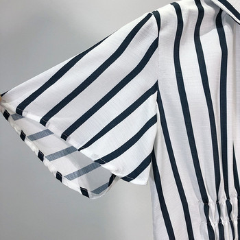 Hosszú csíkos ruha gombokkal