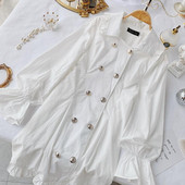 Rochie elegantă de damă cu guler și nasturi în alb-negru