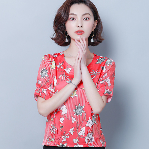 Bluză de damă modernă în patru culori cu motive florale