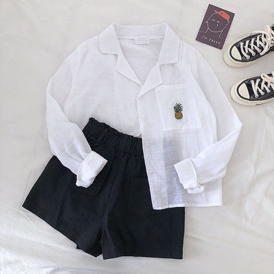 Cămașă de damă cu buzunar și broderie în alb, roșu și albastru