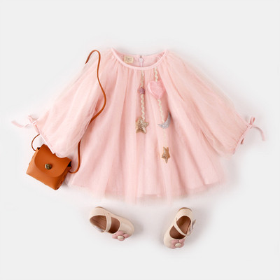 Модерна разкроена детска рокля в розов цвят