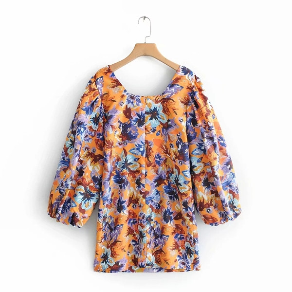 Bluză de damă cu mâneci drepte și lungi colorate