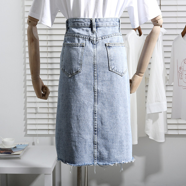 Női farmerszoknya, magas derékkal, szakadt motívumokkal