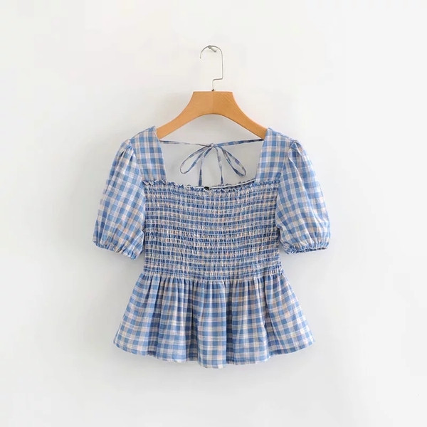 Bluză de damă în carouri cu mâneci scurte de culoare albastră