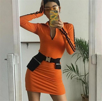 Női sportruha sárga és narancssárga színben cipzárral és szegéllyel az ujjakon