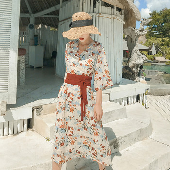 Rochie de dama actuala cu model floral si decolteu in V