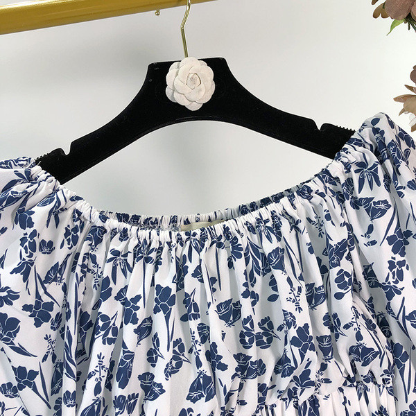 Bluză de damă cu mâneci lungi și model floral