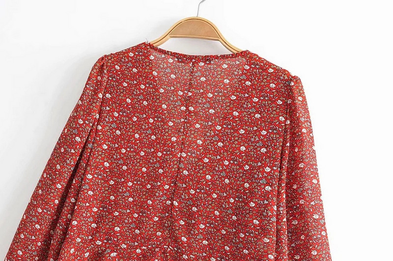 Bluză de damă cu decolteu în V și motiv colorat