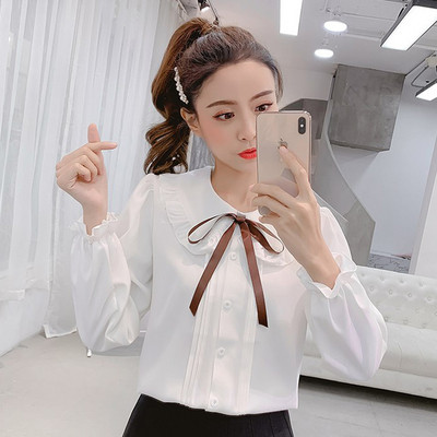 Aktuális női ing fehér és rózsaszín színben, nyakkendővel