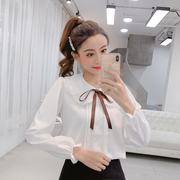 Aktuális női ing fehér és rózsaszín színben, nyakkendővel