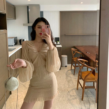 Női modern rövid ruha, hosszú ujjal