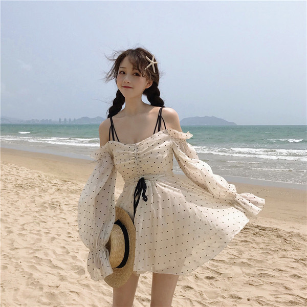 Fehér színű, alkalmi női ruha, hosszú ujjal