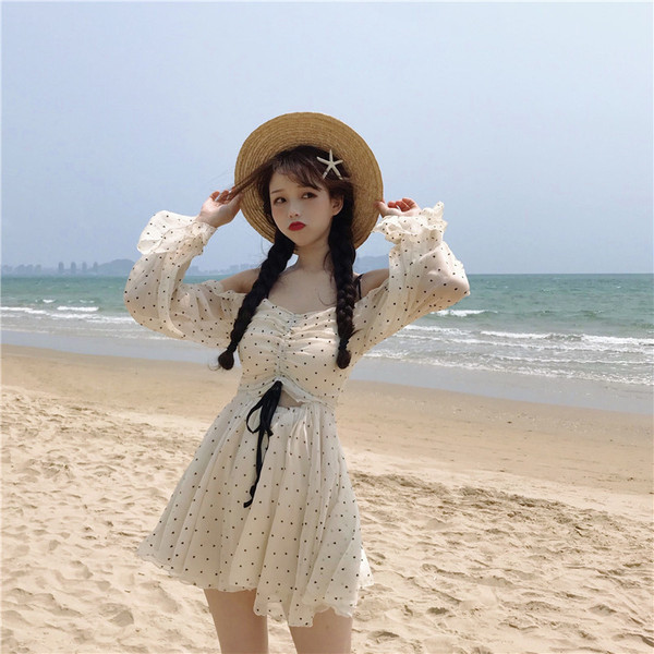 Fehér színű, alkalmi női ruha, hosszú ujjal