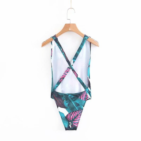 Modern teljes fürdőruha virágmintával és keresztpántokkal