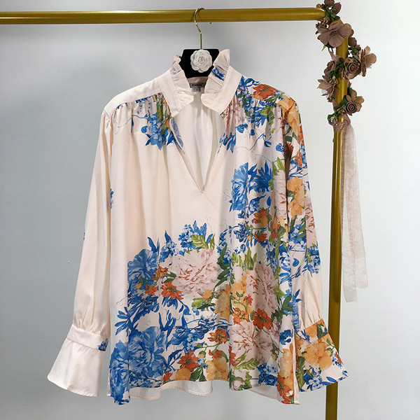 Női széles, hosszú ujjú ing, fehér színben, virágmintával