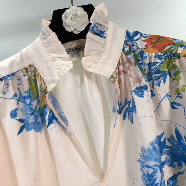 Női széles, hosszú ujjú ing, fehér színben, virágmintával