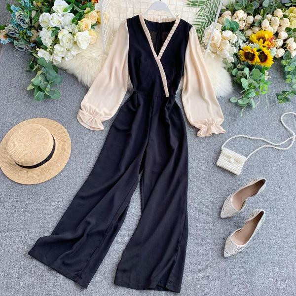 Stílusos női overall széles modell V-nyakú fekete színben