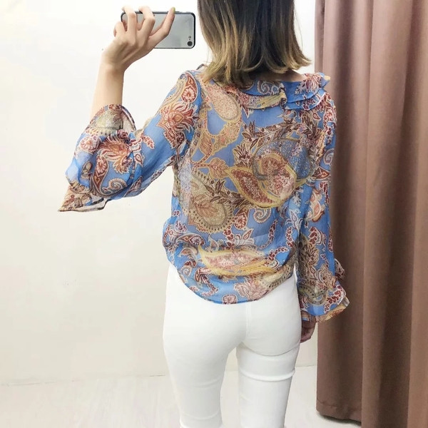 Cămașă modernă de damă cu mâneci lotus de culoare albastră