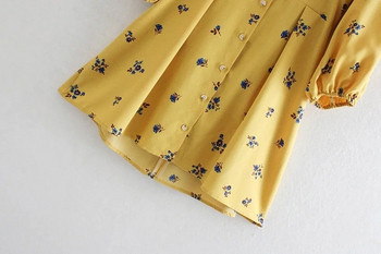 Rochie de damă cu mâneci lungi și decolteu în V de culoare galbenă