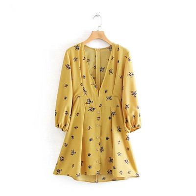 Rochie de damă cu mâneci lungi și decolteu în V de culoare galbenă