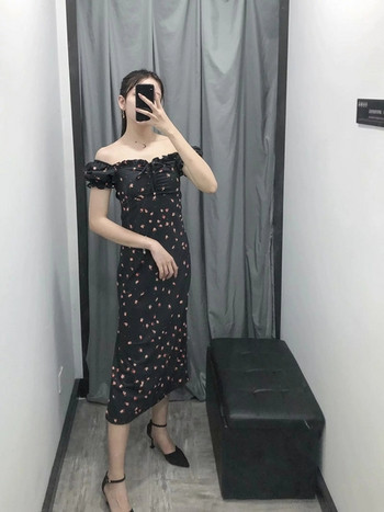 Rochie elegantă de damă în negru, cu umerii goi