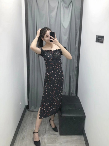 Rochie elegantă de damă în negru, cu umerii goi
