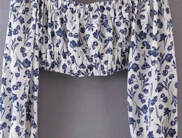 Bluză de damă modernă cu umerii goi și mâneci lotus