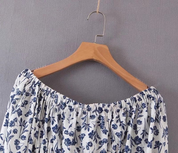 Bluză de damă modernă cu umerii goi și mâneci lotus