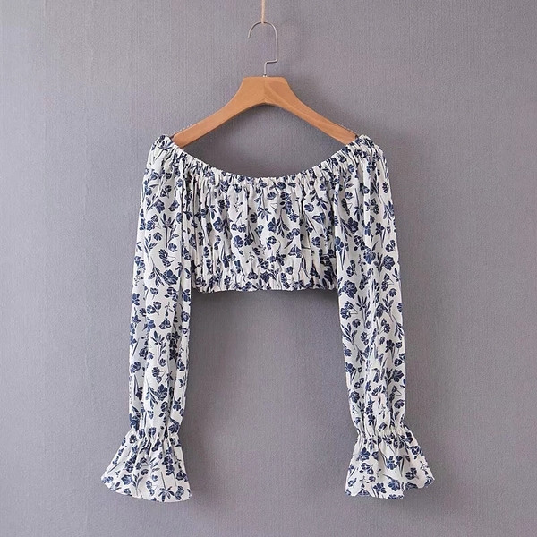 Bluză de damă modernă cu umerii goi și mâneci lotus