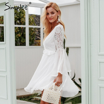 Rochie elegantă de damă cu spatele gol și dantelă în alb și negru