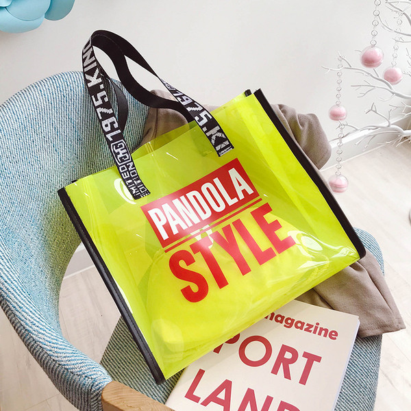 Geanta de dama moderna cu inscriptii in patru culori