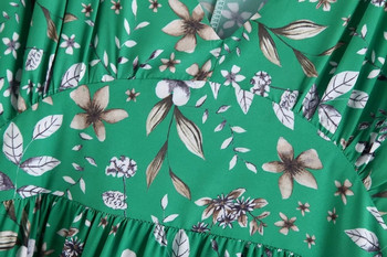 Modern aszimmetrikus női ruha zöld színben