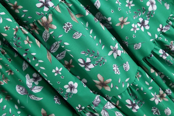 Modern aszimmetrikus női ruha zöld színben