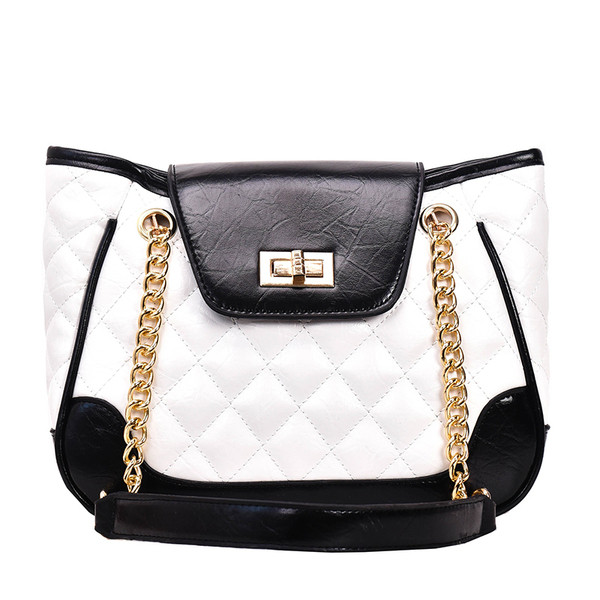 Geanta de dama moderna cu elemente metalice alb-negru