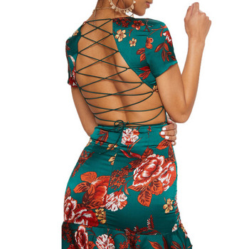 Stílusos női ruha mély nyakkivágással, zöld színben